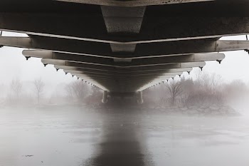 Under Bridge On Foggy Waters