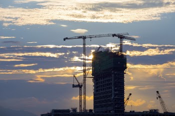 Unfinished Concrete Building With Tower Crane