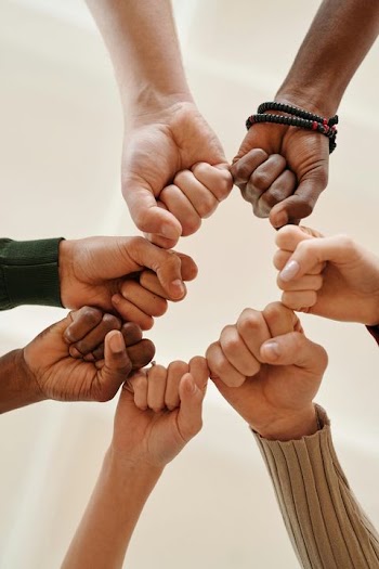 Unity in Diversity: Hands Coming Together in a Circular Motion