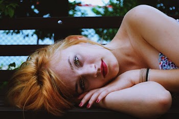 Unknown Celebrity Lying on Bench