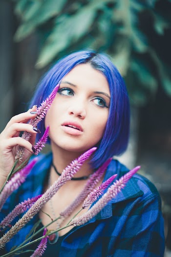 Unknown Celebrity Near Pink Flowers