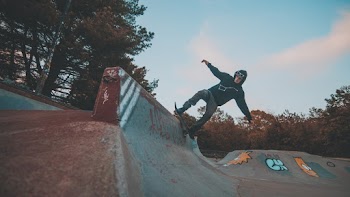 Unknown Person Skateboarding Outdoors