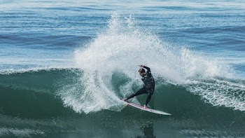 Unknown Person Surfing