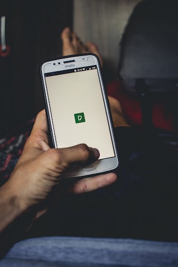 Unknown Person Using Smartphone