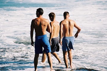Unknown Persons Enjoying on Beach