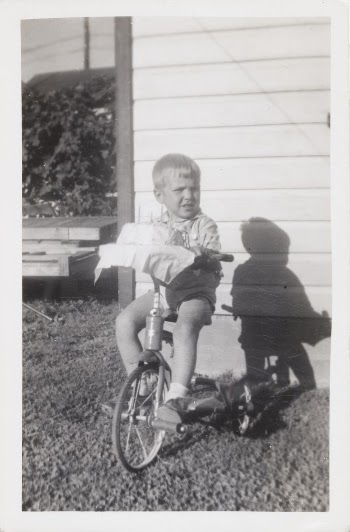 Untitled (Little Boy on a Tricycle | Free Photo - rawpixel