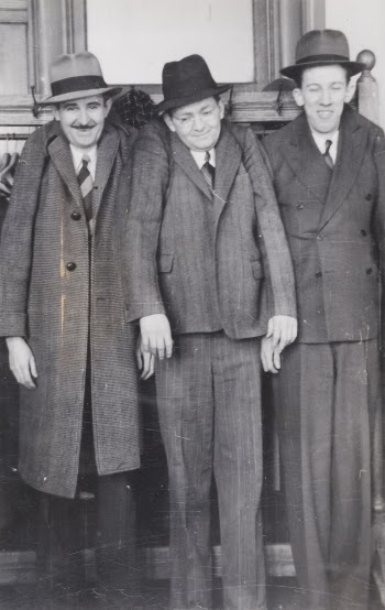 Untitled (Three Men in Coats | Free Photo - rawpixel