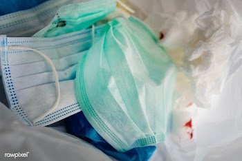 Used face masks in a contaminated waste bin | Free  photo - 2290184