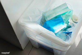 Used face masks in a contaminated waste bin | Free  photo - 2295923