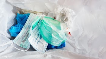 Used face masks in a contaminated waste bin | Free  photo - 2296329