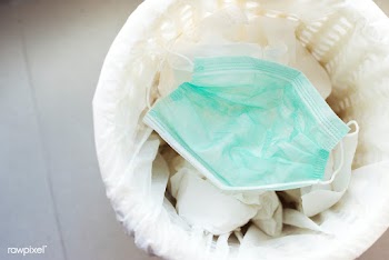 Used face masks in a contaminated waste bin | Free  photo - 2296415