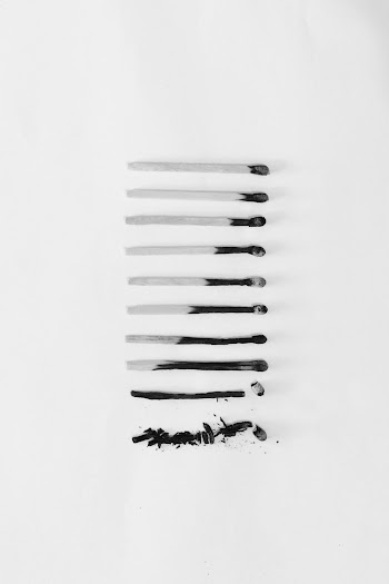 Used Matchsticks on White Background