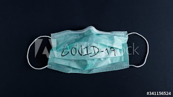Used medical face mask during coronavirus pandemic