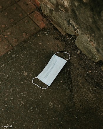 Used medical mask thrown on the street | Free  photo - 2332464