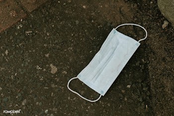 Used medical mask thrown on the street | Free  photo - 2332536