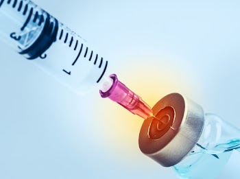Vaccine vial with a needle syringe
