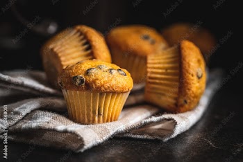 Vanilla muffins. Sweet cupcakes.