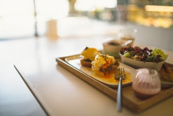 Vegetable Salad and Breakfast Sliders on Brown Wooden Tray