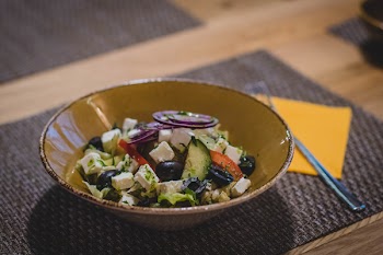 Vegetable Slices on Brown Ceramic Bowl
