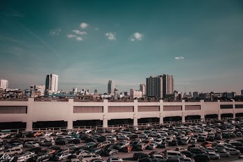 vehicle at park lot taken at daytime