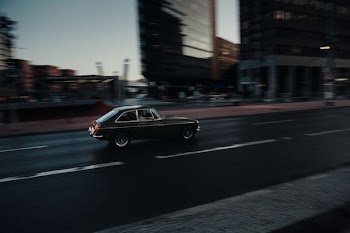 vehicle on road near building