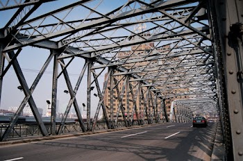Vehicle on Steel Bridge