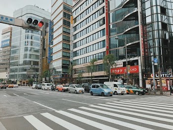 Vehicle Parked Near High-rise Buildings