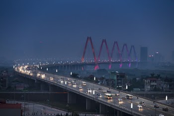 Vehicles on Gray Concrete Bridge
