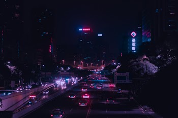 Vehicles On Road At Night