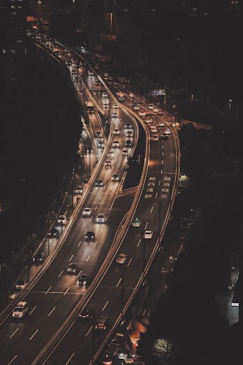 Vehicles on Road at Night Time