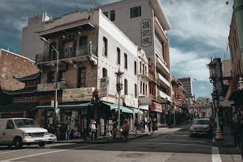 Vehicles on Road Near Buildings during Dyatime