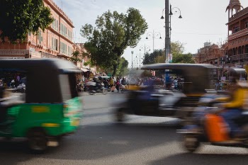 Vehicles on the Road Near Buildings