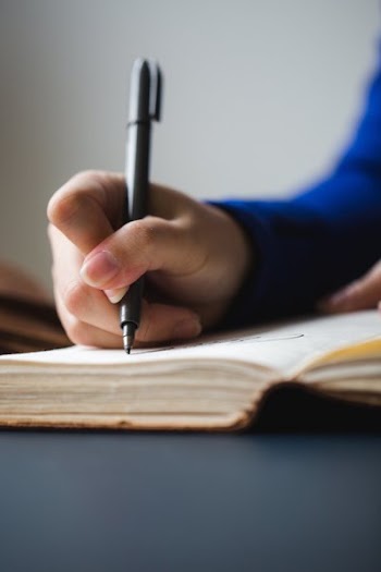 Vertical Image of Hand lettering In Notebook