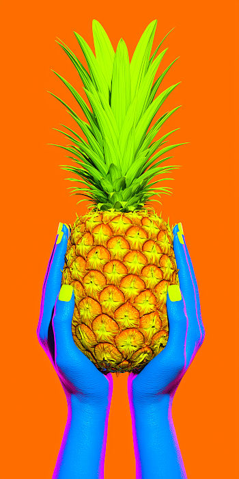 Vibrant Pineapple in Colorful Hands