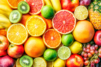 Vibrant Tropical and Citrus Fruit Arrangement