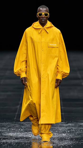 Vibrant Yellow Raincoat Fashion Walk