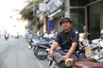 Vietnamese motorbike keeper