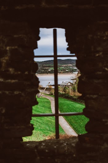 View Of A Body Of Water From A Window