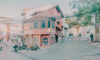 View of a Closed Store With Motorcycle Parked in Front of It