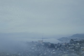 view of a foggy town