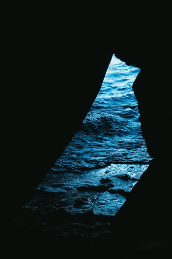 View Of Body Of Water Inside A Cave