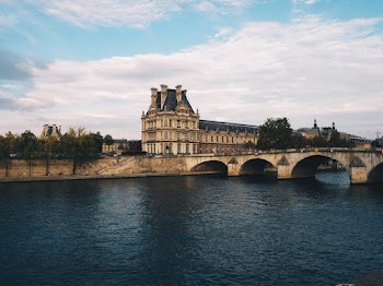View of Bridge and River Under Blue Sky