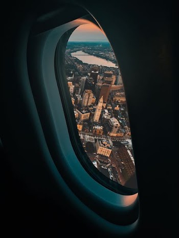 view of city buildings from plane window