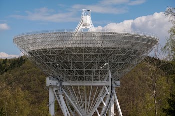 View of Communications Tower Against Cloudy Sky