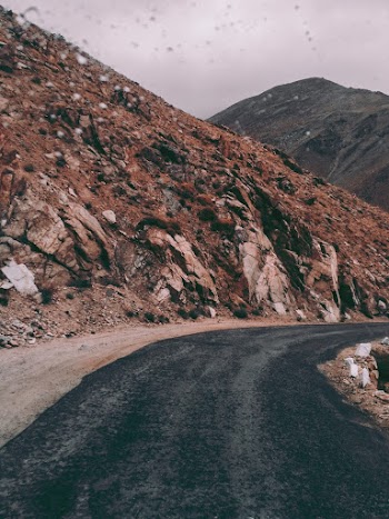 View of Empty Road Near Mountains