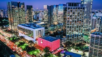 View Of Illuminated Buildings In The City