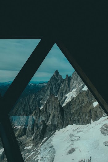 View of Mountain Alps from a Window