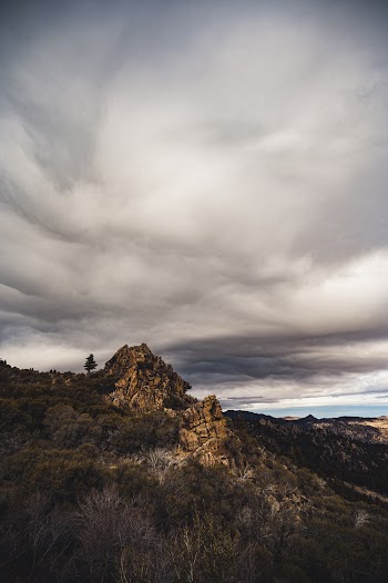 View of Mountain Under Cloudy Sly