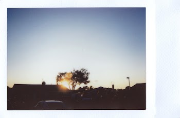 View Of Sunset Above Houses