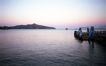 View Of Sunset On A Body Of Water